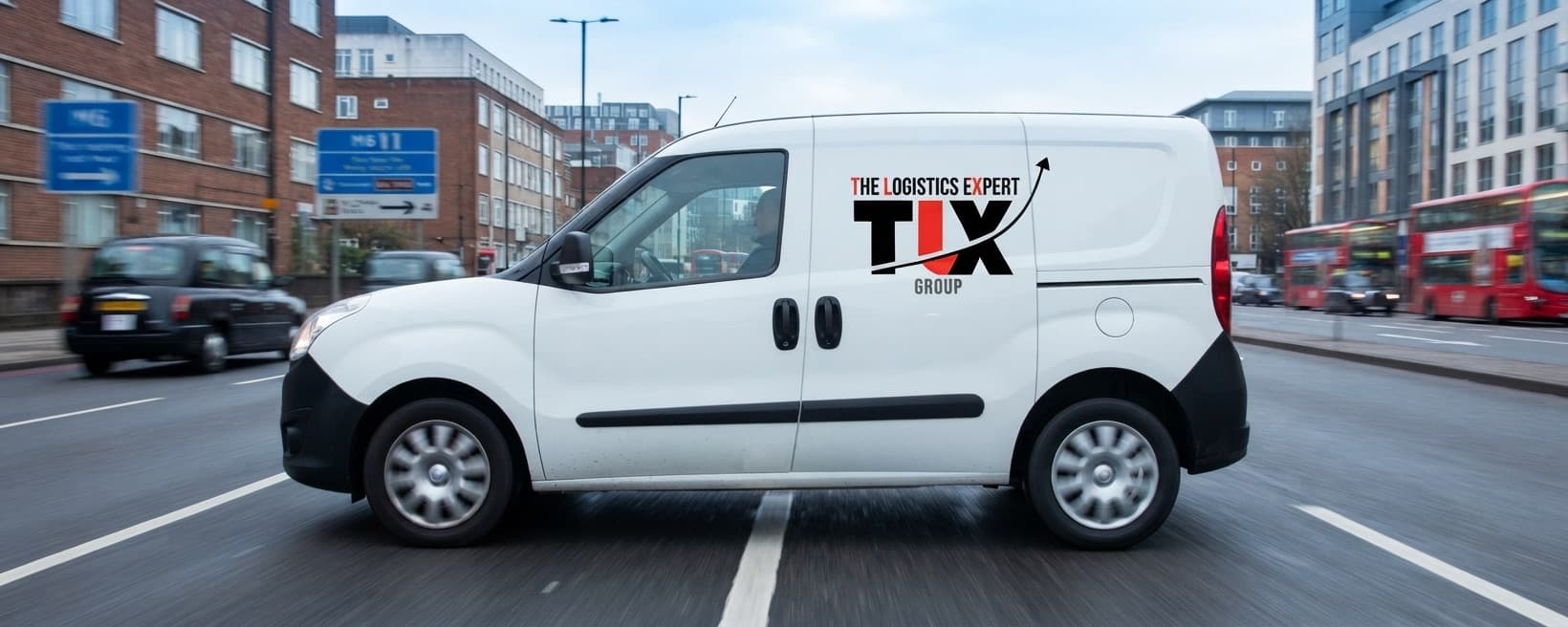 TLX Group small van on an urban road on a same-day run